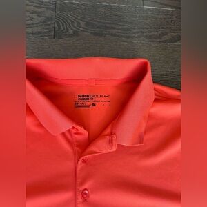 Nike Golf men’s shirt size Large in orange PTP is 22  athletic dry-fit shirt
